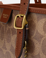 Coach Taxi Tote 21 bag in Signature canvas